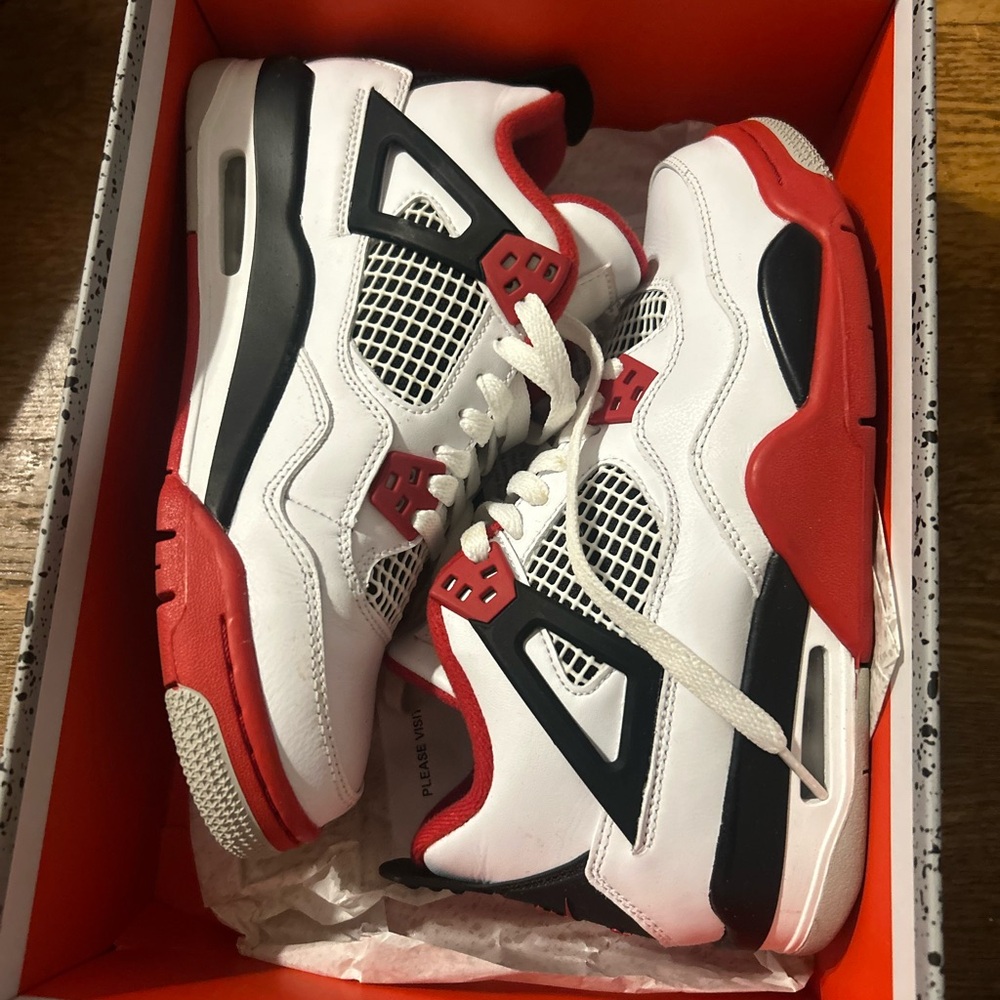 Nike red,white,and black kids shoes